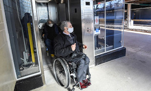 Victor Calise and Edith Prentiss exiting MTA elevator